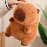 Capybara Kuscheltier mit Hut und Gemüsetasche Die Kuschelecke
