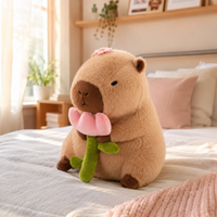 Capybara Plüschtier mit einer Blume Die Kuschelecke
