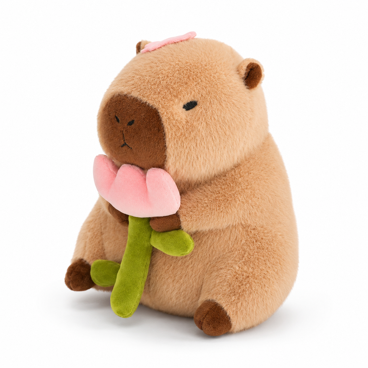 Capybara Plüschtier mit einer Blume Die Kuschelecke