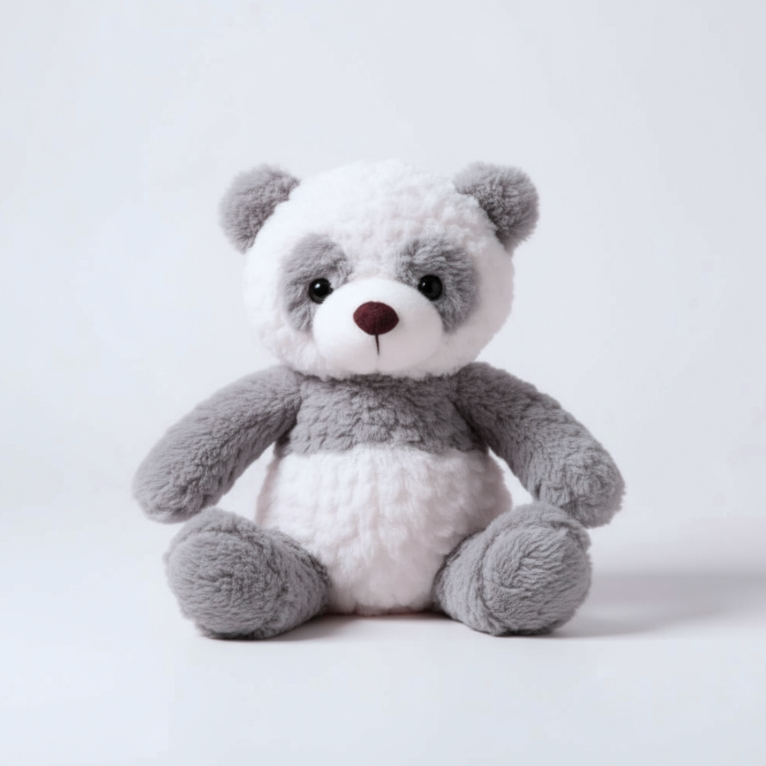 Grauer Panda Kuscheltier weich zum Kuscheln Die Kuschelecke